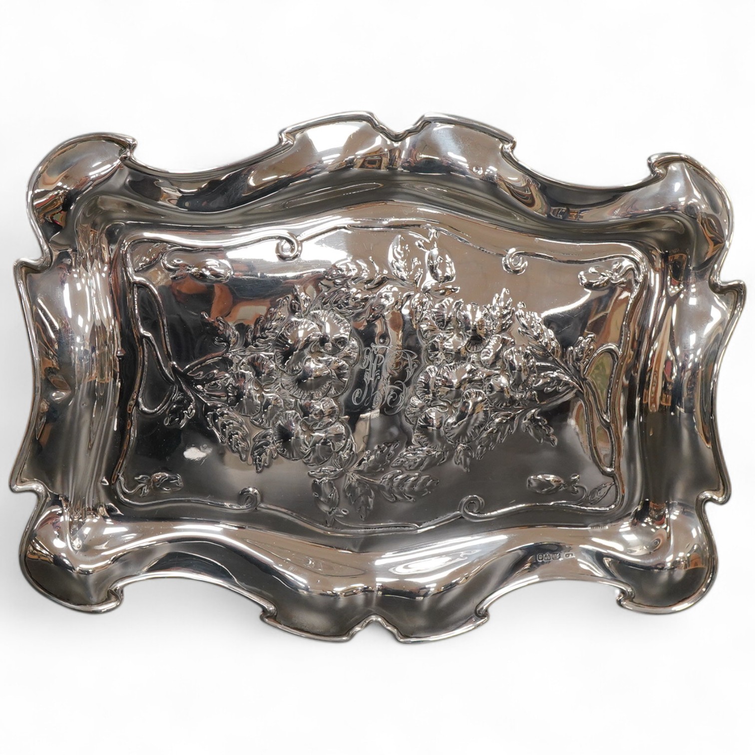An Edwardian repousse silver dressing table tray, William Neale & Son, Chester, 1903, 30cm, 9.2oz.
